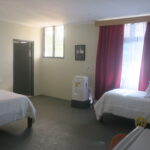 Zaru Hotel - Chambre Deluxe Roadside - Bed
